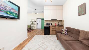 Comfort Apartment, 1 Queen Bed with Sofa bed, Courtyard View | In-room safe, laptop workspace, blackout drapes, soundproofing