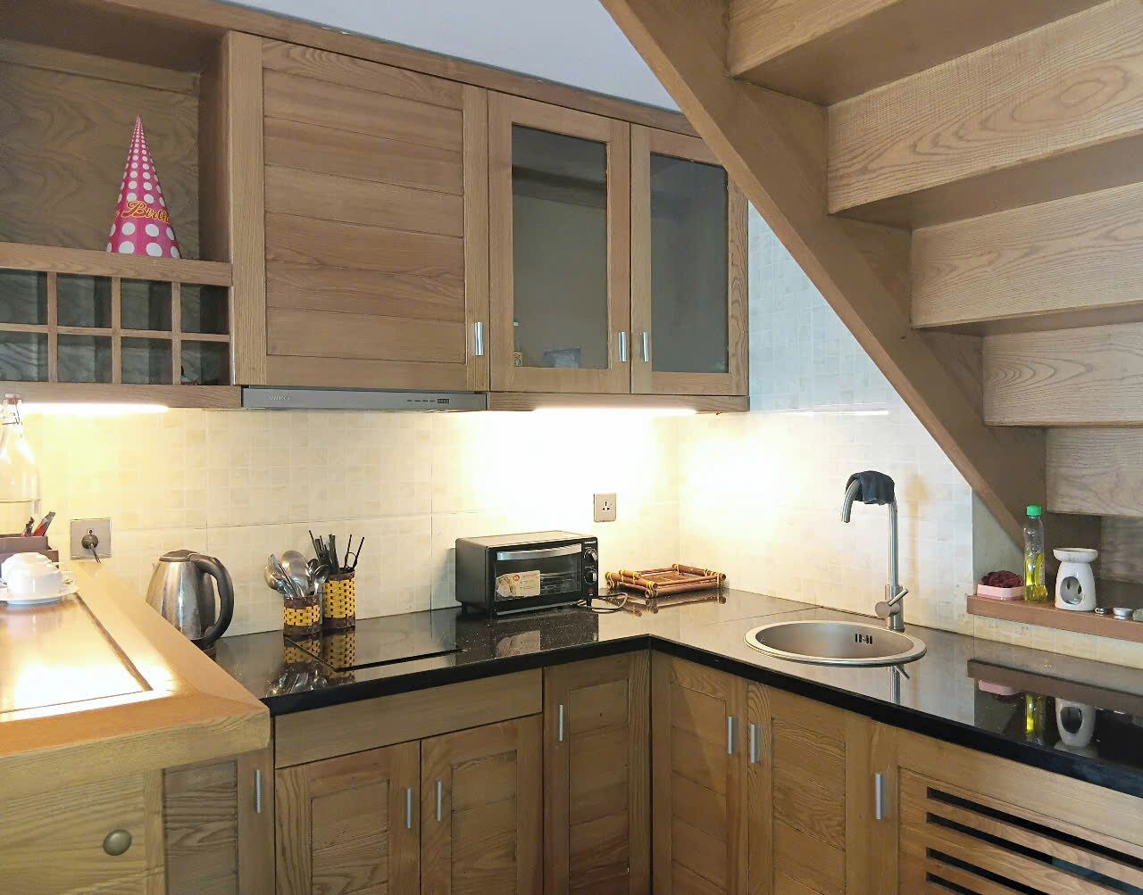 Mini-fridge, microwave, stovetop, coffee/tea maker