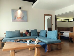 Royal Duplex | Living area | 40-inch Smart TV with digital channels