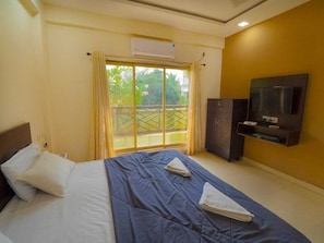 Deluxe Double Room, Balcony, Pool View | Memory-foam beds, desk, free WiFi, bed sheets - Beach Aura by Lavika Stays (Alibag)