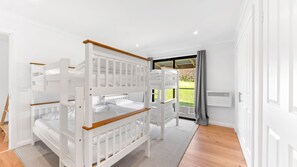 Desk, travel crib, free WiFi, bed sheets