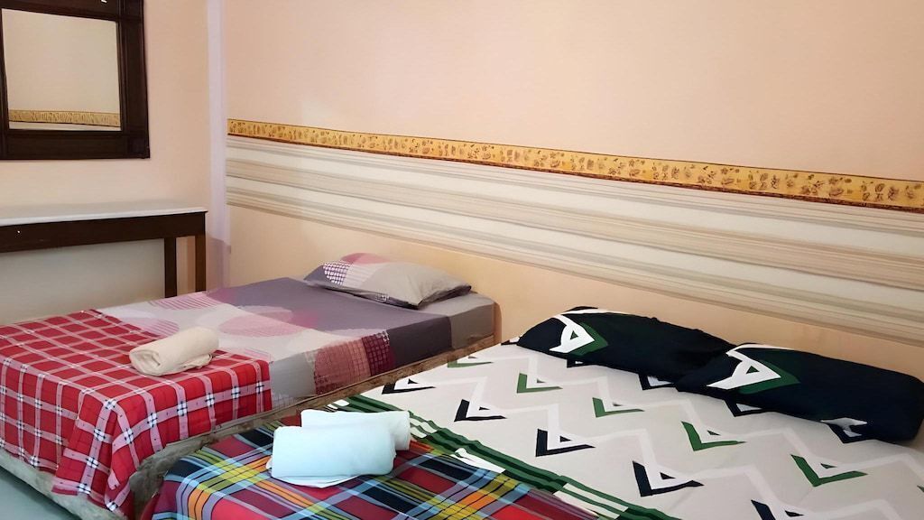 Deluxe Triple Room | Bed sheets