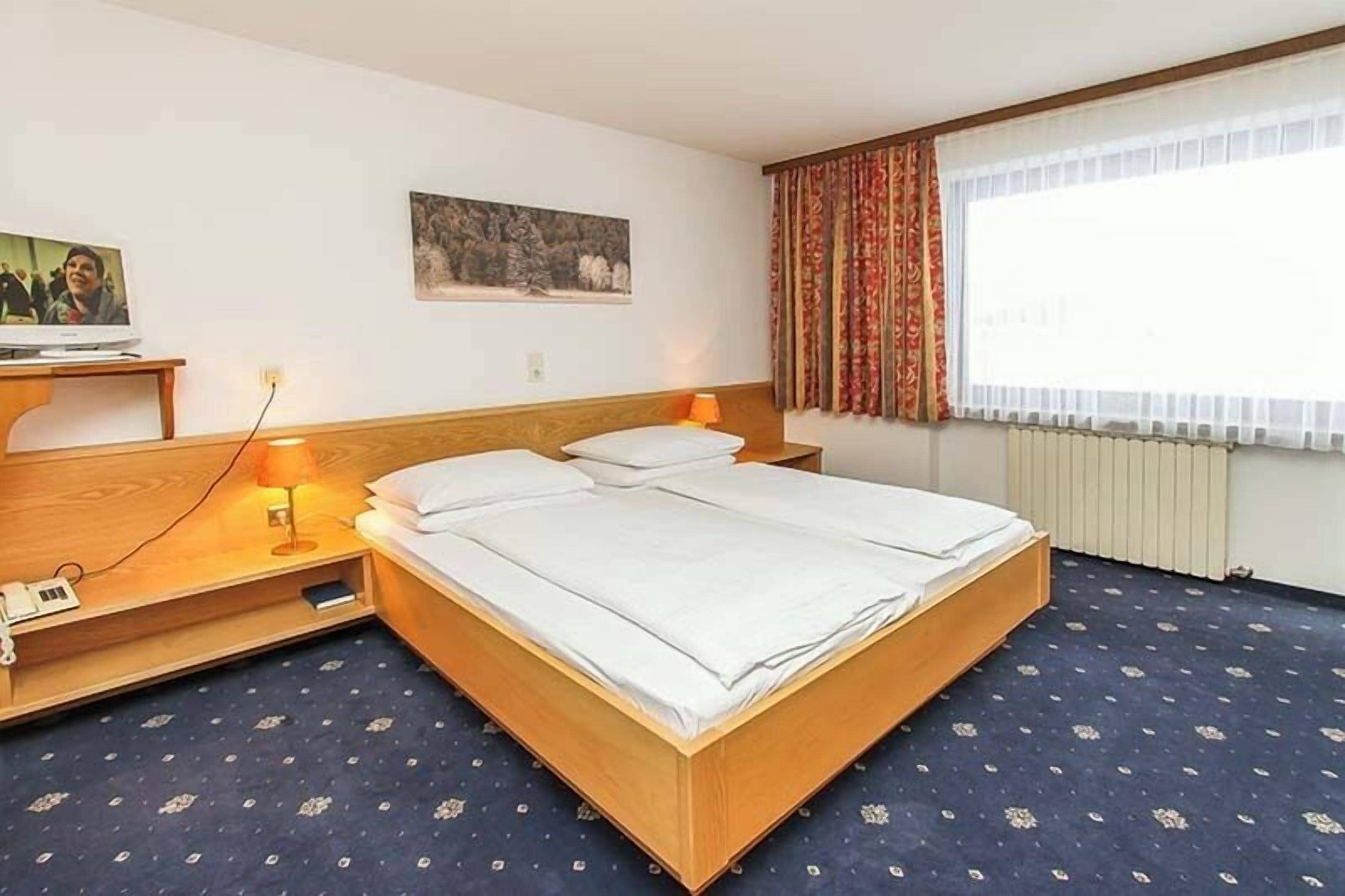 Standard Double Room | In-room safe, blackout curtains, free WiFi