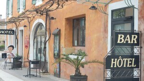 A hotel with outdoor seating and a bar. - Holiday Home with Private Pool, Vagnas (Vagnas)