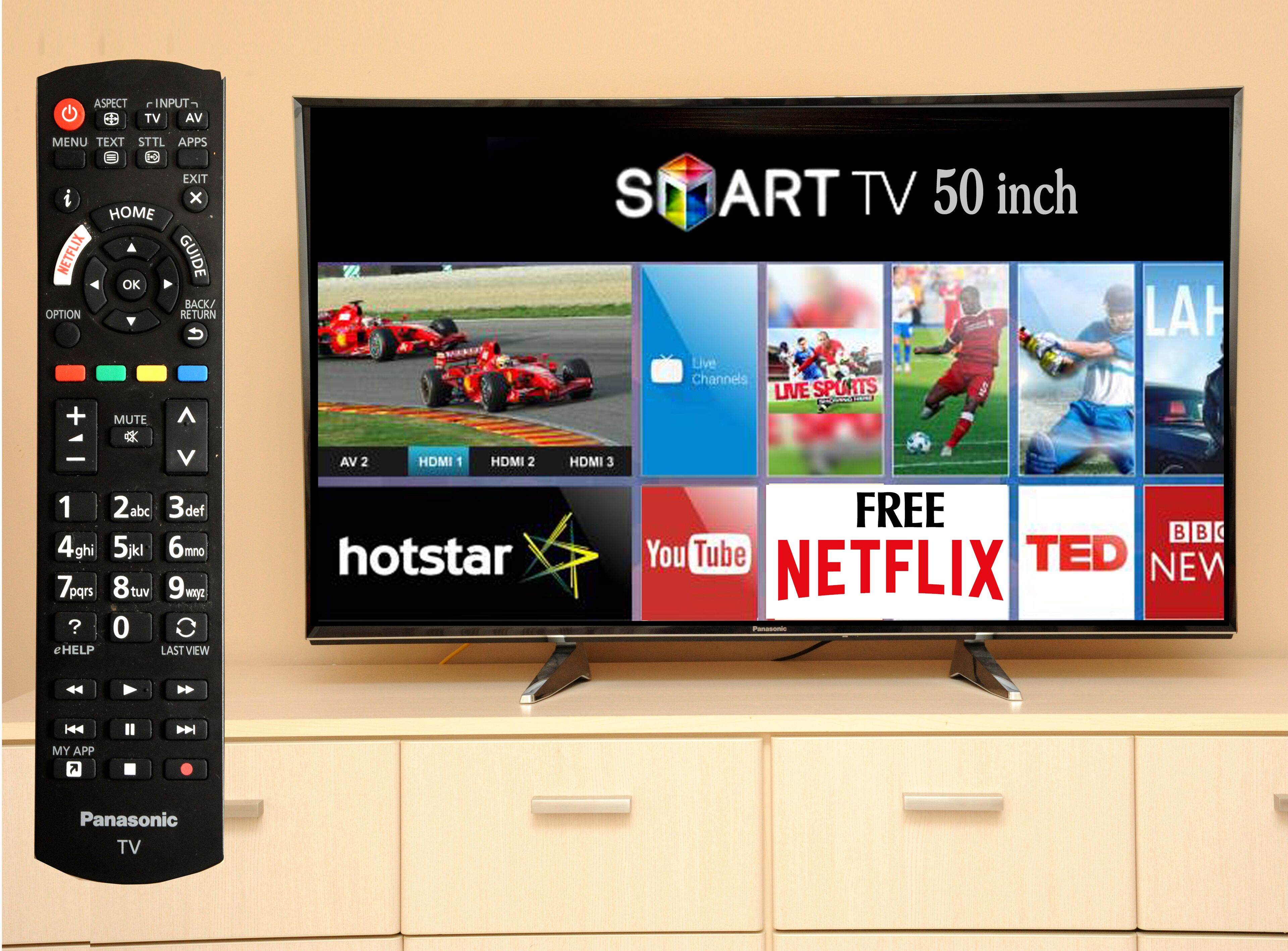 A Panasonic TV with a remote control, displaying a 50-inch Smart TV with various streaming apps like Netflix, Hotstar, YouTube, and BBC News.