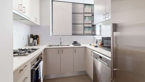 Coffee/tea maker, fridge, microwave, oven - Chic 2BR Inner-City Stay with Balcony (Redfern)