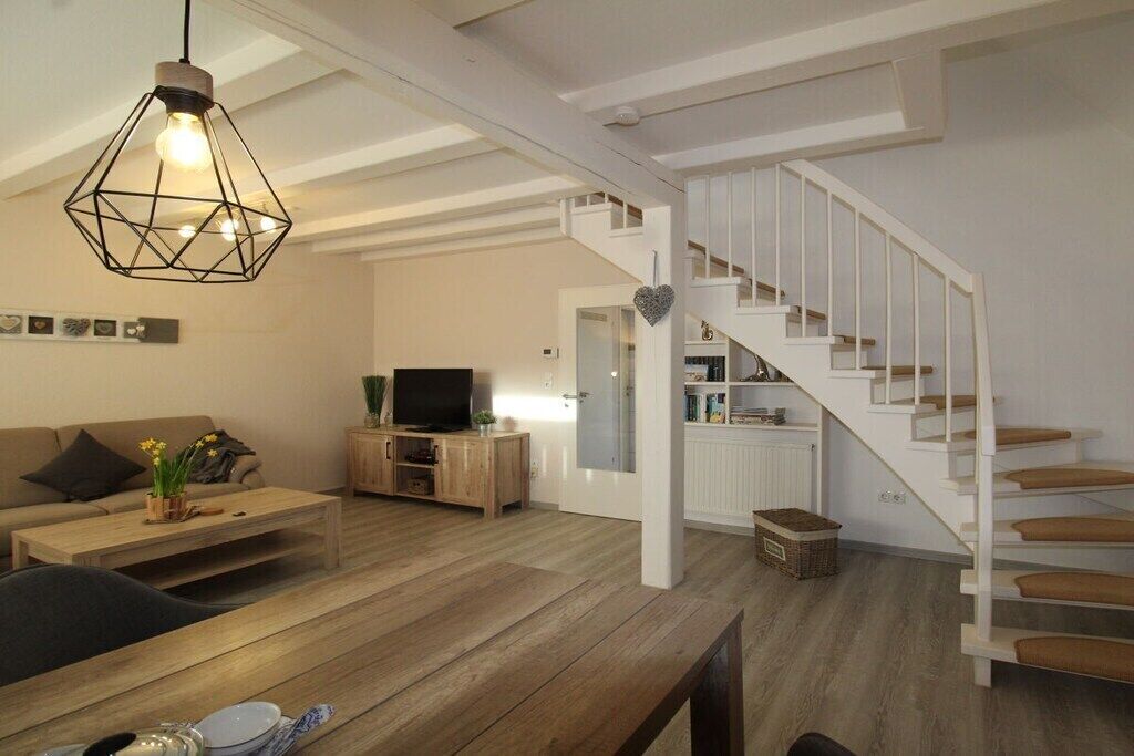 Smart-tv, dvd-spelare och böcker