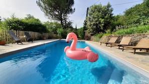 Seasonal outdoor pool, pool umbrellas, pool loungers