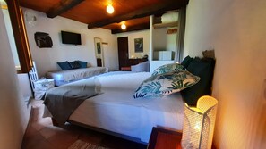 Family Triple Room, Garden View | Premium bedding, memory foam beds, iron/ironing board, travel crib