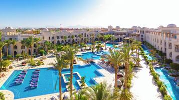 Outdoor pool, open 10:00 AM to 5:00 PM, pool umbrellas, pool loungers