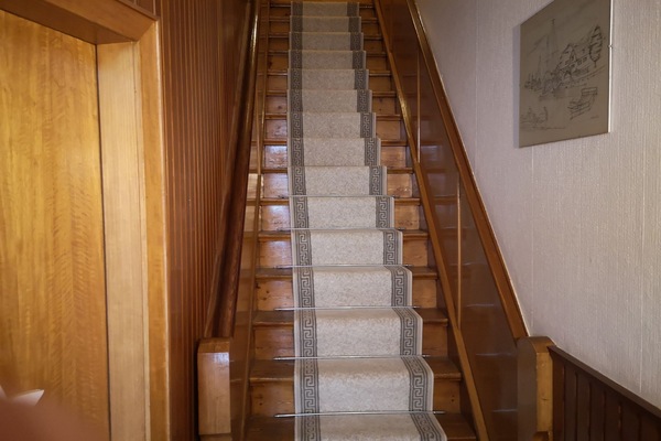 Treppe zum Obergeschoß