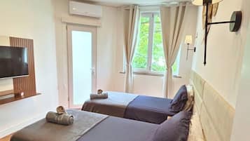 3 quartos, ferros/tábuas de passar roupa, Wi-Fi, roupa de cama