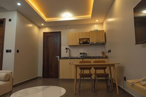 Executive Suite, Balcony, City View | Private kitchen - Sumix Hotel (Entebbe)