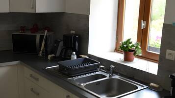 KylskÄp, mikrovÄgsugn, ugn och spishÀll