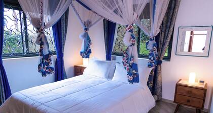 2-bedroom condo in welcoming Kampala with AC, fitness room with a swimming pool