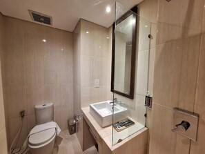 Shower, free toiletries, slippers, towels