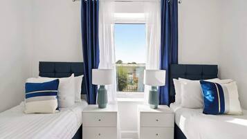 Iron/ironing board, travel crib, WiFi, bed sheets