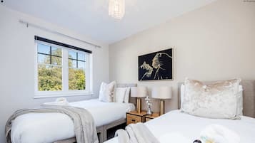 Iron/ironing board, travel crib, bed sheets