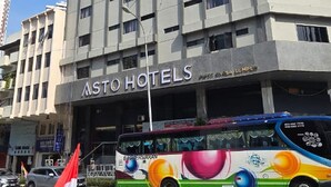 A building with a sign that reads "ASTO HOTELS". - asto hotel (Kuala Lumpur)