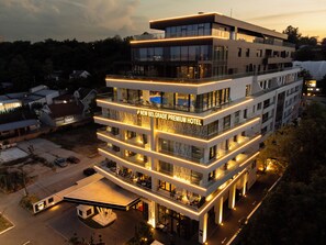 A multi-story hotel with a modern design, featuring balconies and a prominent signage for the New Belgrade Premium Hotel. - New Belgrade Premium Hotel (Belgrade)