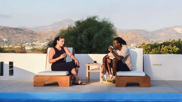 Seasonal outdoor pool, pool umbrellas, sun loungers