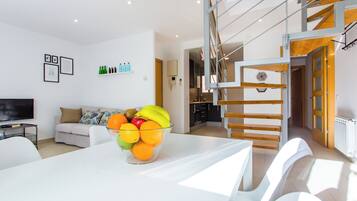 Palmer III. Bright and Comfortable Duplex! | Living area | 32-inch Smart TV with digital channels