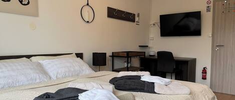Deluxe Triple Room, Non Smoking | In-room safe, free WiFi