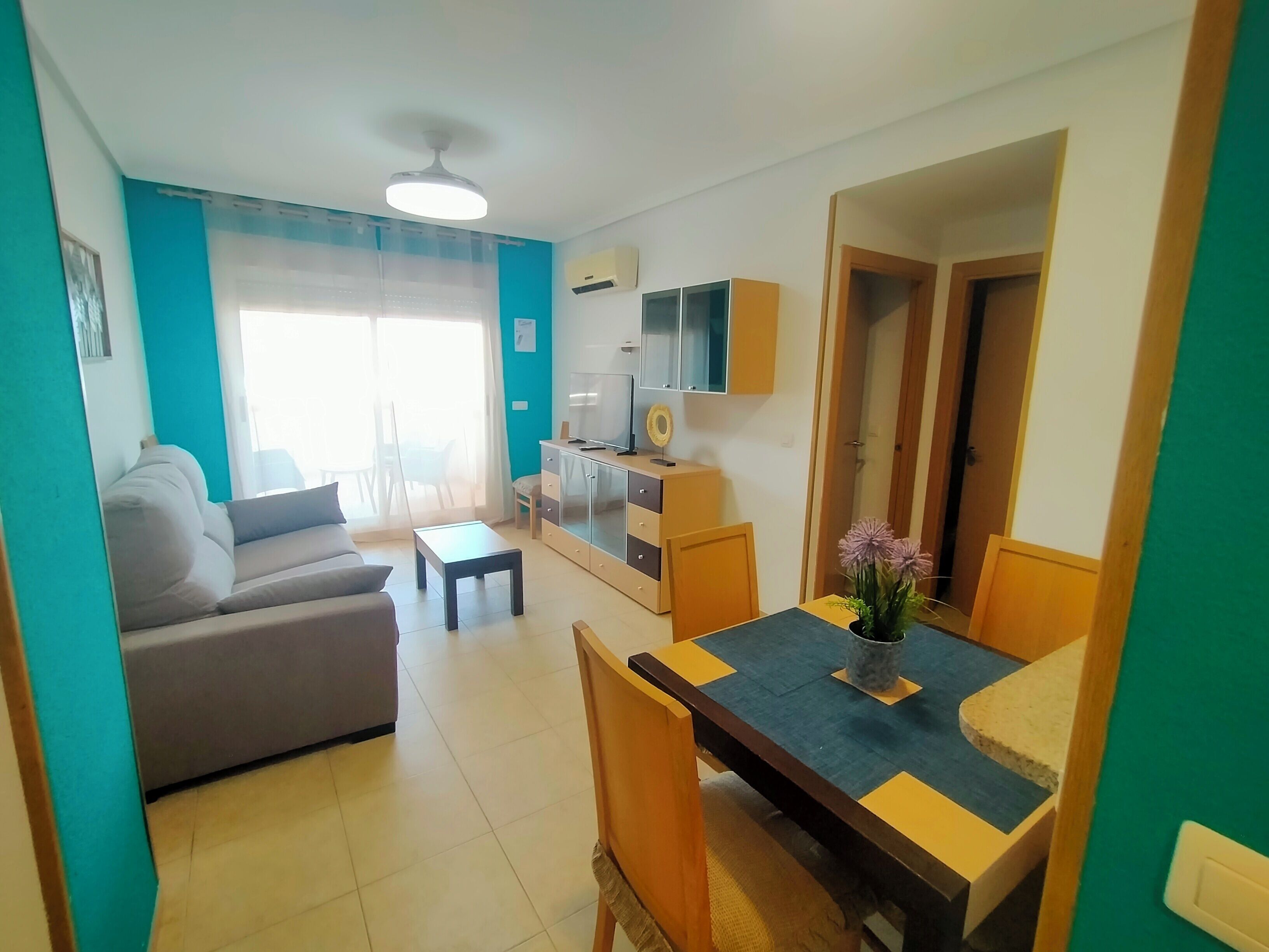 Family Apartment, Balcony, City View | Living area | 32-inch LED TV with digital channels