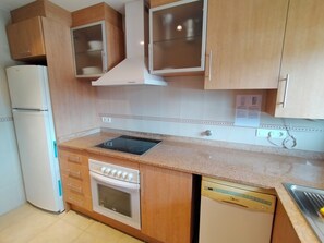 Premium Apartment, Sea View | Private kitchen | Fridge, microwave, oven, stovetop