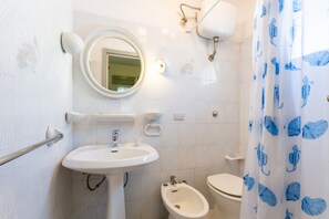 Doccia, asciugacapelli, asciugamani