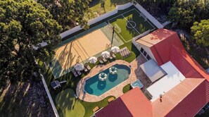 Outdoor pool, a heated pool - 6BR Clearwater Villa: Heated Pool, Gym, Sauna, Pickleball Court, Sleeps 20 (Largo)