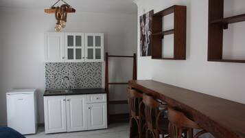 Comfort Apartment, Balcony, Garden View | Private kitchen | Fridge, microwave, stovetop, cookware/dishes/utensils