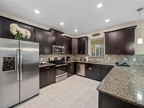 Fridge, microwave, oven, stovetop - Disney 6BR Villa+Pool | ChampionsGate | Sleeps 13 (Kissimmee)