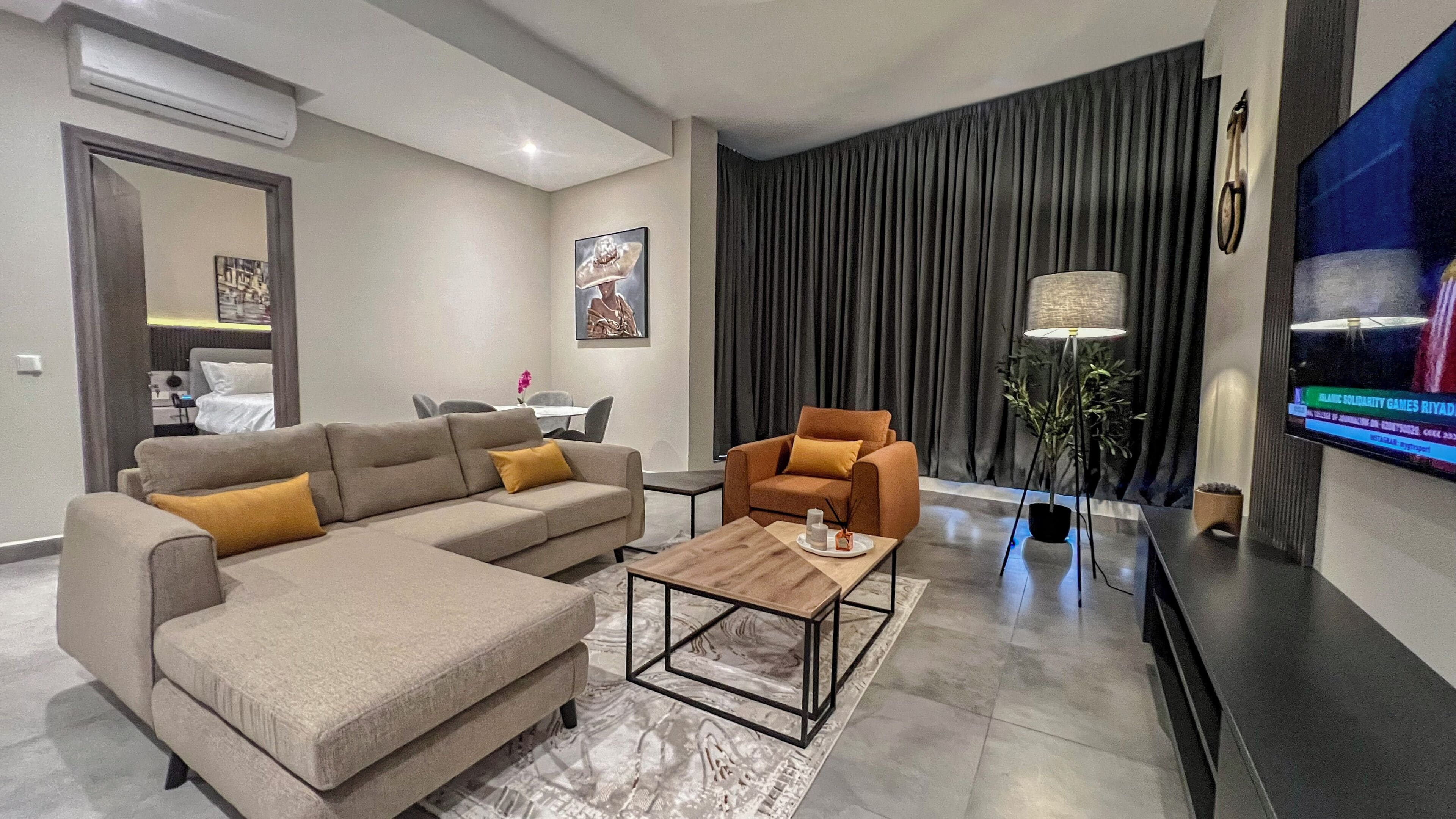 Suite de lujo, 1 habitación, vista a la ciudad | Área de sala de estar