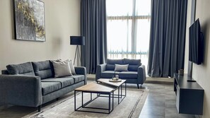 Suite Luxe, 2 chambres, vue ville | Coin séjour