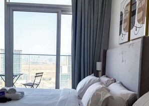 Iron/ironing board, WiFi, bed sheets - Free housekeeping visits during your stay - StayShort - Jumeirah Village Circle Studio with Amazing Amenities! (Jumeirah Village Circle)