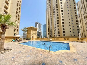 Pool - Free housekeeping visits during your stay - StayShort - Chic Apartment in JBR Sleeps 3 with Canal View! (Jumeirah Beach Residence)