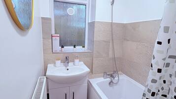Hair dryer, towels, soap, toilet paper