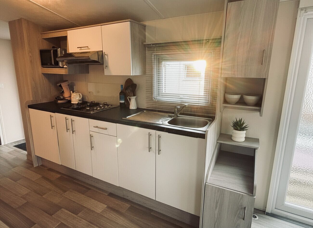 Coffee/tea maker, fridge, microwave, oven