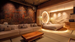 A modern bedroom with a sofa, a bed, a wooden coffee table, and a wall with a circular light fixture. - Walking distance from Asakusa｜ Moon presentation only in January and February｜ Rice cooking and sake｜ Private use of one floor｜ Couple/Family｜ 36 square meters｜ Max. 4 persons (Matsugaya, Taito City)
