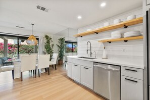 Fridge, microwave, oven, stovetop - Designer renovated 2 bedroom, 2.5 bathroom home in Oasis Country Club (Palm Desert)