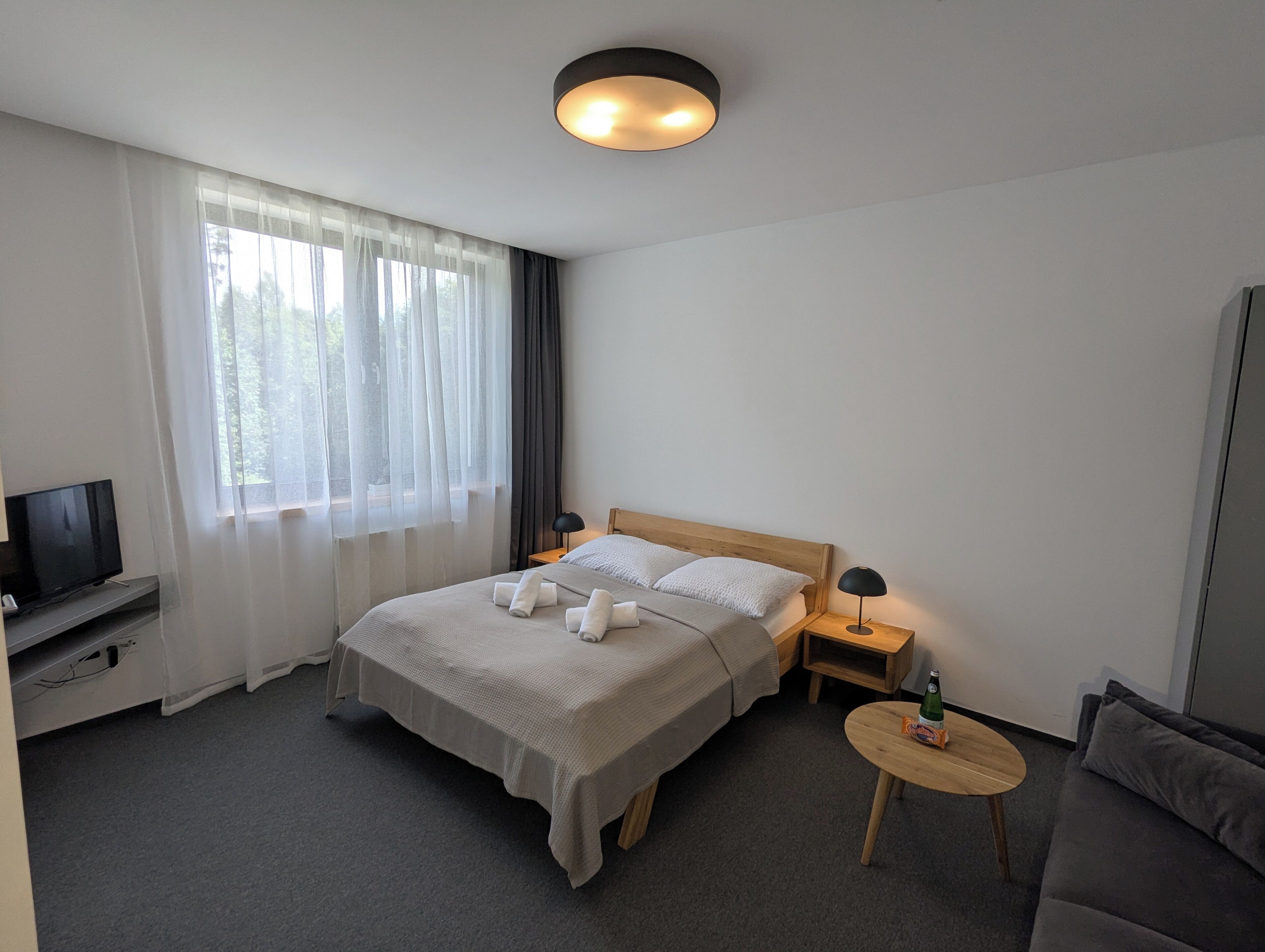 컴포트 아파트, 정원 전망, 산비탈 | 각각 다른 스타일의 인테리어, 각각 다르게 가구 비치, 암막 커튼, 무료 WiFi