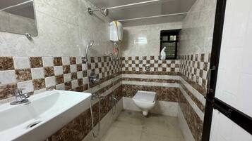 Shower, free toiletries, towels, soap
