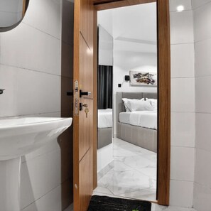 Shower, towels, soap, toilet paper