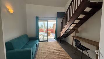 Family Quadruple Room, Ocean View | Living area