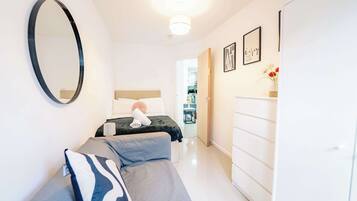 Desk, iron/ironing board, travel crib, WiFi