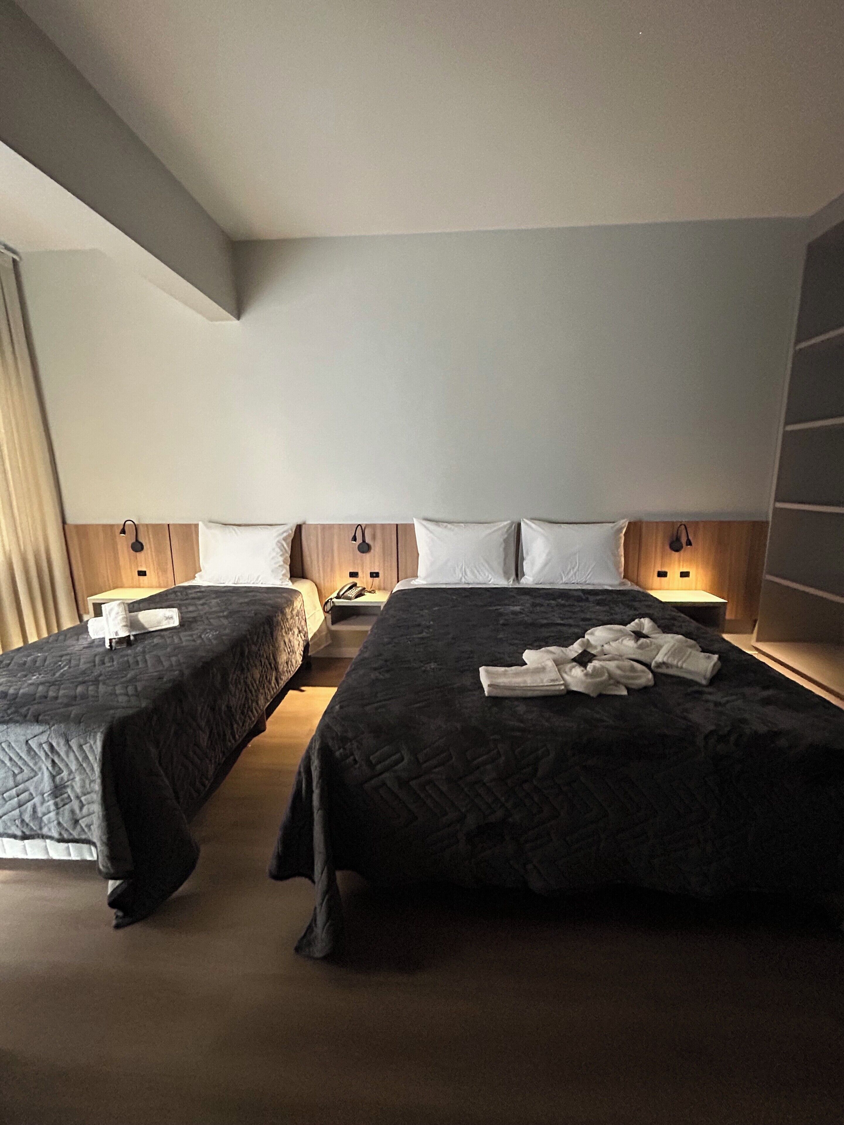 Family Double Room | Minibar, desk, laptop workspace, iron/ironing board