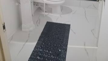 Shower, towels, soap, toilet paper