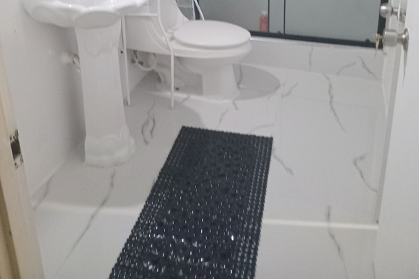 Shower, towels, soap, toilet paper