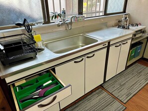 Fridge, microwave, stovetop, coffee/tea maker